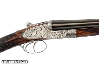 HOLLAND & HOLLAND ROYAL 12 GAUGE 2 INCH CHAMBERS - TWO 2 BARREL SET
SIDE BY SIDE SHOTGUN