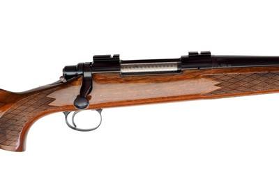REMINGTON MODEL 700 ADL BOLT ACTION RIFLE 7MM REMINGTON MAGNUM - 24" BARREL