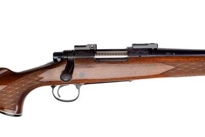 REMINGTONK MODEL 700 BDL CUSTOM DELUXE ENGRAVED BOLT ACTION RIFLE .243 WINCHESTER - 22" BARREL - Image 1 of 20