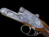 LIKE NEW AND UNFIRED - HOLLAND & HOLLAND ROYAL DELUXE DOUBLE RIFLE .375 H&H FLANGED MAGNUM - PHILIPPE GRIFNEE ENGRAVED - Image 2 of 19