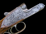 LIKE NEW AND UNFIRED - HOLLAND & HOLLAND ROYAL DELUXE DOUBLE RIFLE .375 H&H FLANGED MAGNUM - PHILIPPE GRIFNEE ENGRAVED - Image 1 of 19