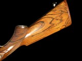 LIKE NEW AND UNFIRED - HOLLAND & HOLLAND ROYAL DELUXE DOUBLE RIFLE .375 H&H FLANGED MAGNUM - PHILIPPE GRIFNEE ENGRAVED - Image 11 of 19