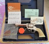 Colt Single Action Army (SAA), in
44-40 - Nickel w/Carved Ivory Grips - 1 of 15