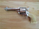 Colt Single Action Army (SAA), in
44-40 - Nickel w/Carved Ivory Grips - 3 of 15