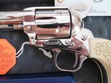 Colt Single Action Army (SAA), in
44-40 - Nickel w/Carved Ivory Grips - 4 of 15