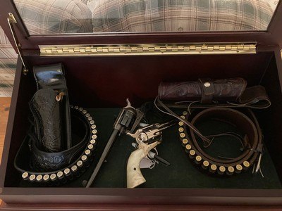 Colt Single Action Army – Two 2nd-Generation SAA Rigs in Display Case