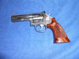 Preown Smith & Wesson .357 Magnum with 4" barrel, Model 686, Stainless, excellent condition - 1 of 2