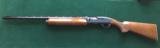 Remington 1100 LH Left Hand 12 gauge - 1 of 15