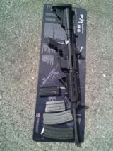 DPMS Oracle Panther Model A-15, 4 magazines, and a spam can full of ammo - 1 of 3