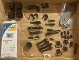 Gun sights, rings, trigger shoes, pad, plate, sling swivels, peep sight, misc. - 1 of 3
