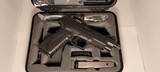 Springfield Armory XDM OSP 4.5" w/ Vortex Venom 3moa, t-barrel, and standard barrel. - 4 of 5