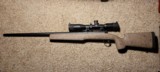 6.5CM 26" Savage Model 12 in Bell & Carlson Tactical/Varmint stock, SWFA 20x Optic w/ Vortex Bubble Level - 1 of 2