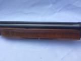 Remington 1100 SKEET B 12 gauge semi-auto 25” bbl with beautiful figured wood - 14 of 15