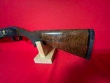 Remington 1100 28ga
2004 Wild Turkey Federation Gun - 4 of 15