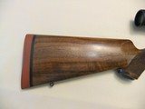 KIMBER
" HUNTER" RIFLE
IN 308..... A BEAUTIFUL LITE WEIGHT HUNTER WITH BLOND WOOD - 6 of 8
