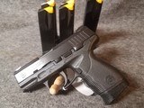 Used Taurus PT 24/7 in 9MM with 6mags. - 2 of 6