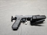 Glock 22 40 S&W-and has a 357 Sig Barrel - 5 of 11