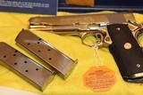 1989 COLT 1911 45 ACP. GOLD CUP NATIONAL MATCH ENHANCED,,, WITH ALL FACTORY BOX AND CASE AND PAPER WORK ONE OWNER SUPER COLLECTABLE AWSOME ALL O.E.M. - 2 of 13