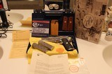1989 COLT 1911 45 ACP. GOLD CUP NATIONAL MATCH ENHANCED,,, WITH ALL FACTORY BOX AND CASE AND PAPER WORK ONE OWNER SUPER COLLECTABLE AWSOME ALL O.E.M.