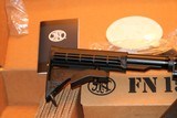 FN 15 CARBINE ALLOY/BLACK
5.56 X 45 16 INCH BARREL 30 ROUND MAG,, NEW ONLY OUT OF PLASTIC FOR PICTURES AWSOME SET UP,,,, - 8 of 13