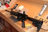 FN 15 CARBINE ALLOY/BLACK
5.56 X 45 16 INCH BARREL 30 ROUND MAG,, NEW ONLY OUT OF PLASTIC FOR PICTURES AWSOME SET UP,,,, - 4 of 13