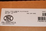 FN 15 CARBINE ALLOY/BLACK
5.56 X 45 16 INCH BARREL 30 ROUND MAG,, NEW ONLY OUT OF PLASTIC FOR PICTURES AWSOME SET UP,,,, - 13 of 13