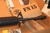 FN 15 CARBINE ALLOY/BLACK
5.56 X 45 16 INCH BARREL 30 ROUND MAG,, NEW ONLY OUT OF PLASTIC FOR PICTURES AWSOME SET UP,,,, - 10 of 13