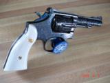 S&W Model 48-4 K-22 masterpice Magnum J. Adams Engraved Full coverage .22WMRF Cal. MINT - 2 of 8