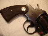 Colt Official Police .22Caliber 6" BBl. MFG 1953 Excellent in Original box Test target, Brush Handling the Handgun - 13 of 13