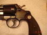 Colt Official Police .22Caliber 6" BBl. MFG 1953 Excellent in Original box Test target, Brush Handling the Handgun - 6 of 13