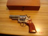 S&W Mod.57 No dash Bright Nickel 4"BBl. MINT in Presentation case MFG 1976 Papers and tools - 2 of 10