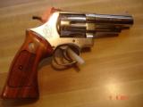 S&W Mod.57 No dash Bright Nickel 4"BBl. MINT in Presentation case MFG 1976 Papers and tools - 10 of 10