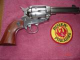Ruger Vaquero Bright Stainless in .44/40 Win.4 5/8"BBl. MFG 1996? Mint All original with 2-piece Walnut stocks - 2 of 8
