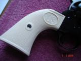 Rare USFA 12/22 SA Revolver ANIB MFG 2006
Full Dome Blue Old ivory Stocks 5 1/2" BBl. .22LR Cal. - 7 of 11