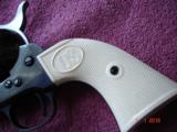 Rare USFA 12/22 SA Revolver ANIB MFG 2006
Full Dome Blue Old ivory Stocks 5 1/2" BBl. .22LR Cal. - 5 of 11