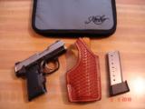 Kimber Solo Carry 9m/m
MIB With Crimson trace laser grips Extra Mag. Beautiful El Paso Custom Holster