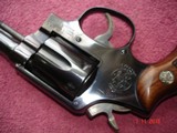 Rare S&W Mod. 45-2 MP Post Office
.22LR. Revolver 1 of 500 MFG1962
4"BBl Original Box, Lettered, Excellent, Magna Stocks Numbered to Rev. - 14 of 15