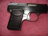 Browning Baby .25 ACP
Semi-Auto Pistol MFG 1965 Mint 2"BBl. Blue, Black Checkered Stocks. - 2 of 13