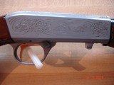 Browning Grade II .22Semi-Auto
Takedown Rifle .22 LR Cal. Mint in Box, MFG 1987 Beautiful dark Walnut Stocks, Hand Engraved Satin Silver receiver - 7 of 12