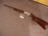 Browning Grade II .22Semi-Auto
Takedown Rifle .22 LR Cal. Mint in Box, MFG 1987 Beautiful dark Walnut Stocks, Hand Engraved Satin Silver receiver - 1 of 12