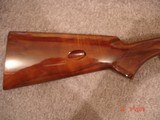 Browning Grade II .22Semi-Auto
Takedown Rifle .22 LR Cal. Mint in Box, MFG 1987 Beautiful dark Walnut Stocks, Hand Engraved Satin Silver receiver - 4 of 12