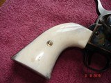 USFA Premium SA B&C 7 1/2"BBl.
.45 Colt
Excellent in Box , papers ,Sock Original Blk. Stocks and a Beautiful
Set of Elk Stags Stocks. - 6 of 13