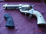 USFA
China Camp SA .45 Colt 5 1/2" BBl. NIB
2 sets of Stocks Blk.Rubber and True Ivory MFG 9-15-2000 All Papers Etc. - 2 of 15