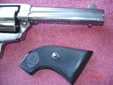 USFA
China Camp SA .45 Colt 5 1/2" BBl. NIB
2 sets of Stocks Blk.Rubber and True Ivory MFG 9-15-2000 All Papers Etc. - 13 of 15
