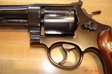 S&W .38/44 Outdoorsman L-frame D/A revolver Model of 1950
5-Screw Rare 6 1/2"BBl. 1 of 6039 MFG. Excellent all Original MFG 1953 - 4 of 14
