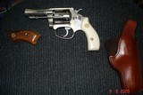 S&W Rare Mod.650
.22M.R.F. Service Kit Gun Stainless J-frame 3"Heavy BBL. Round Butt Walnut stocks and a Beautiful set of
Elk Stag Stocks, ETC - 2 of 15