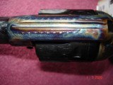Rare USFA 15th. Anniversary edition 1 of 15 .45 Colt Factory Engraved Full Coverage 5 1/2"BBl.Blue & Case Walnut Stocks NIB #4 - 18 of 20