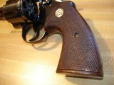 Colt Official Police
.38 Spec. 6"HB MFG 1955 Excellent
all Original
With Full Checkered Walnut Target Stocks Silver Medallions - 6 of 14