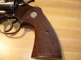 Colt Official Police
.38 Spec. 6"HB MFG 1955 Excellent
all Original
With Full Checkered Walnut Target Stocks Silver Medallions - 9 of 14