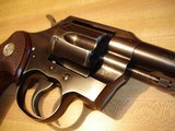 Colt Official Police
.38 Spec. 6"HB MFG 1955 Excellent
all Original
With Full Checkered Walnut Target Stocks Silver Medallions - 11 of 14
